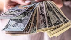 Bank notes.SimpleImages/Getty