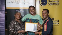 Next Media's Lilian Mutesi receiving her certificate of attendance at the CEO Apprenticeship Program (CAP)program
