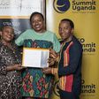 Next Media's Lilian Mutesi receiving her certificate of attendance at the CEO Apprenticeship Program (CAP)program