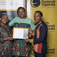 Next Media's Lilian Mutesi receiving her certificate of attendance at the CEO Apprenticeship Program (CAP)program