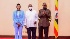 Phiona Nyamutoro and Eddy Kenzo posing with President Yoweri Museveni