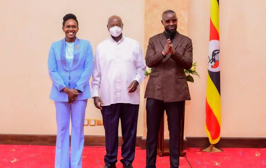 Phiona Nyamutoro and Eddy Kenzo posing with President Yoweri Museveni