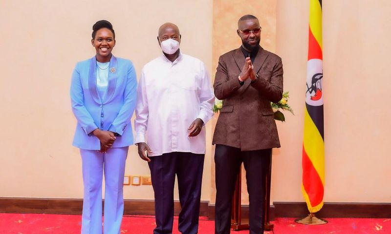 Phiona Nyamutoro and Eddy Kenzo posing with President Yoweri Museveni