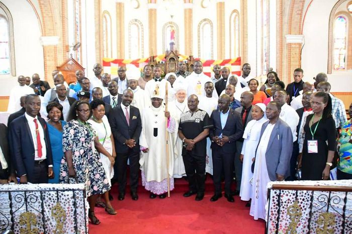Tayebwa with Church leaders and believers