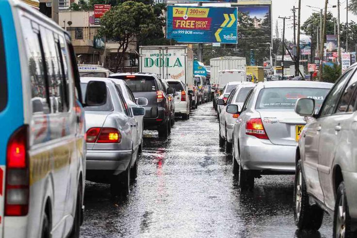 Heavy traffic on a Kenyan road during the rainy season