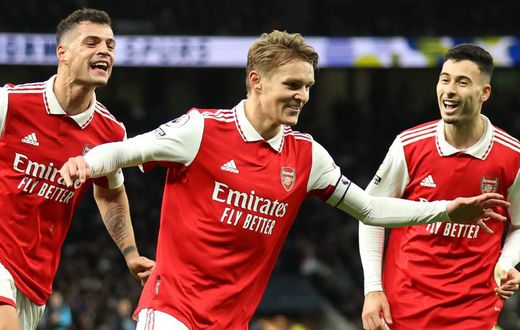 Arsenal's Martin Odegaard celebrates after scoring their second goal