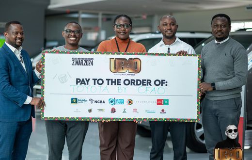 Next Media team led by Deputy Group CEO, Joe Kigozi (extreme left) posing with the CFAO Motors Uganda Marketing Manager, Isaac Tegule (extreme right) at the CFAO offices in Kampala