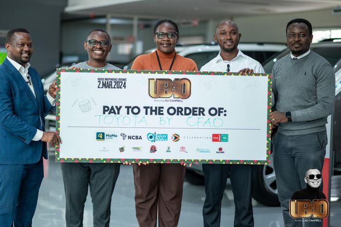 Next Media team led by Deputy Group CEO, Joe Kigozi (extreme left) posing with the CFAO Motors Uganda Marketing Manager, Isaac Tegule (extreme right) at the CFAO offices in Kampala