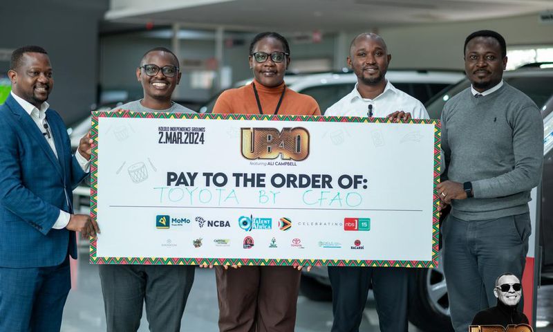 Next Media team led by Deputy Group CEO, Joe Kigozi (extreme left) posing with the CFAO Motors Uganda Marketing Manager, Isaac Tegule (extreme right) at the CFAO offices in Kampala