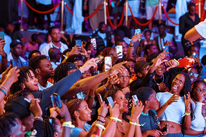 Audience engaging with performer on stage at the Best Of Kampala season two edition which took place at the Lugogo Tennis Stadium, Kampala, Uganda