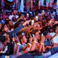Audience engaging with performer on stage at the Best Of Kampala season two edition which took place at the Lugogo Tennis Stadium, Kampala, Uganda