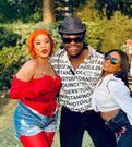 Dancers Valentino and Donlyn Fischer pose for a picture with DJ Zato