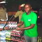 SSP Rogers Nsereko Kauma, the Kampala Metropolitan Traffic Police Commander recieving the refreshementfrom CCBU's Kirunda Magoola