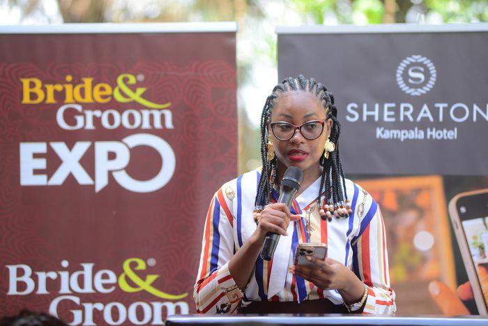 Evelyn Nansikombi the UBL Acting Brand Manger, Baileys gives a specch at the Bride and Groom Expo launch at Sherato Kampala Hotel