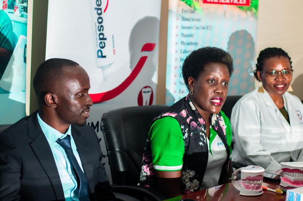 Doctor Joel Oroni (L) Unilever Managing Director Joanite Mukasa Menya (C) and Doctor Nevise Agirembabazi (R)