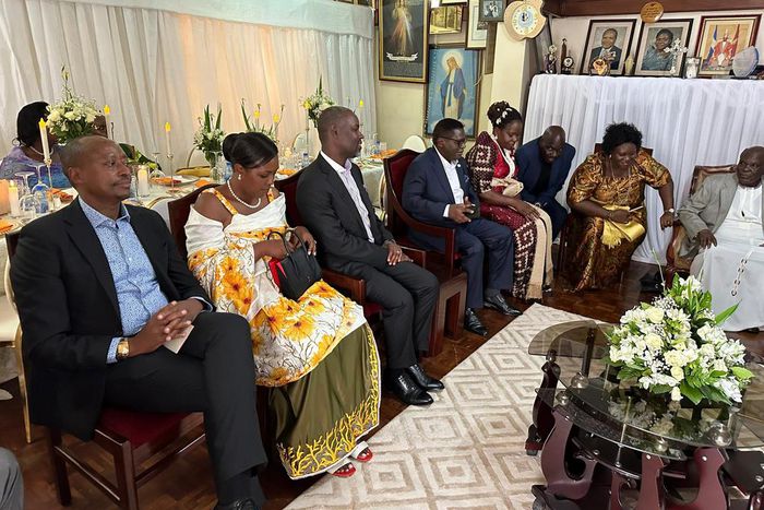 Minister Norbert Mao (in glasses) was introduced by his lover Beatrice on Sunday