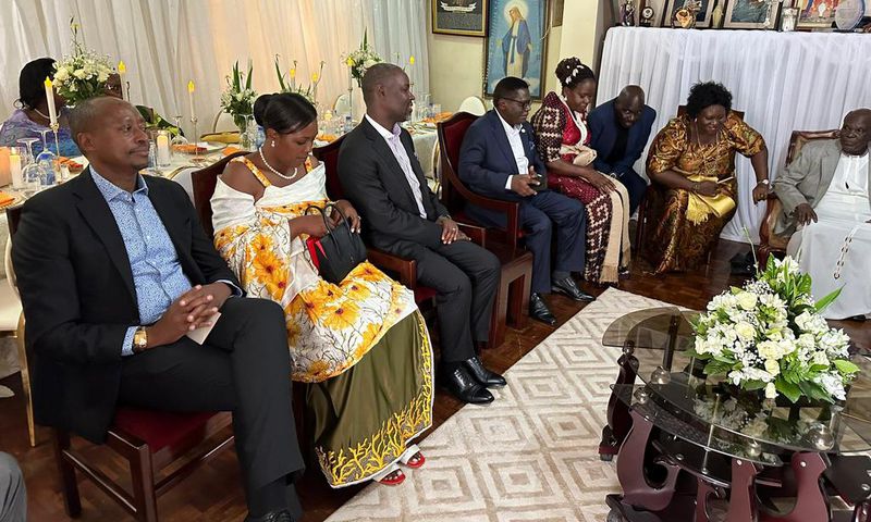 Minister Norbert Mao (in glasses) was introduced by his lover Beatrice on Sunday