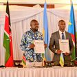 Hon. Kipchumba Murkomen (Cabinet Secretary, Ministry of Roads and Transport, Kenya), Hon. Jimmy Gasore (Minister of Infrastructure, Rwanda), and Hon. Fred Byamukama (Uganda's State Minister for Transport) display a signed report following the Joint Min...