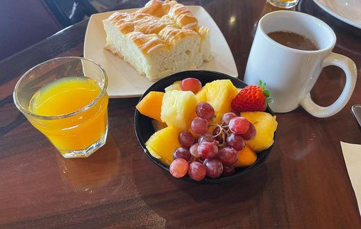 You also get fresh fruit and pineapple-coconut breakfast bread.