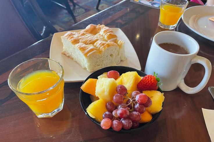 You also get fresh fruit and pineapple-coconut breakfast bread.