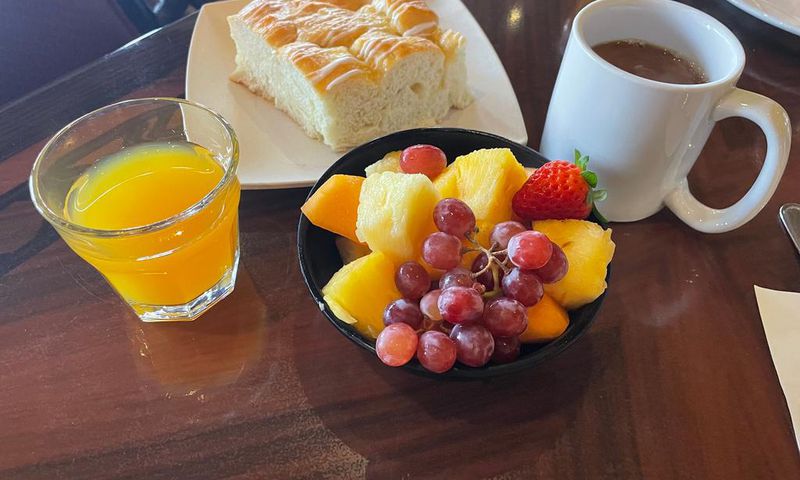 You also get fresh fruit and pineapple-coconut breakfast bread.