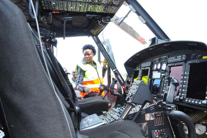 Minister Evelyn Anite checks out one of the Bar Aviation Helicopters at Kajjansi Airfield