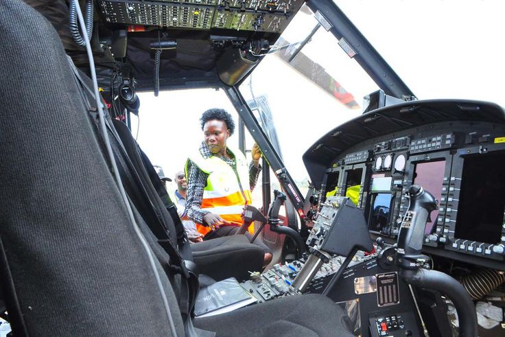Minister Evelyn Anite checks out one of the Bar Aviation Helicopters at Kajjansi Airfield