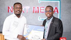 Next Media Chief Marketing Officer receiving the the certificate of appreciation from a MUBs representative