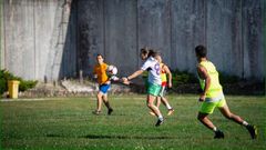 Female and male prisoners play football at Spain's Teixeiro Prison