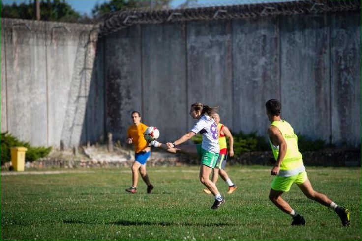 Female and male prisoners play football at Spain's Teixeiro Prison