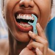 Flossing gets rid of food and plaque between your teeth