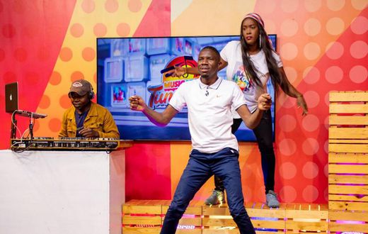 Sanyuka TV presenters, Kalela, Ann Taylor and DJ Muteesa Pro during their evening show