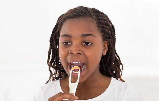A lady tongue scrapping