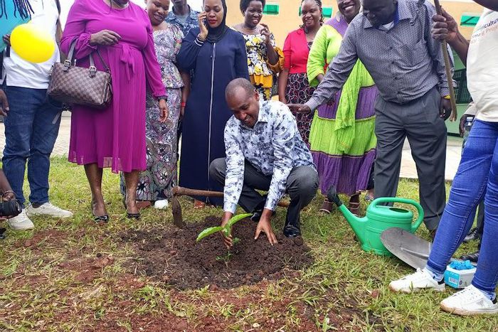 Minister Frank Tumwebaze planted a coffee tree at the celebrations to mark World Food Day in Mukono