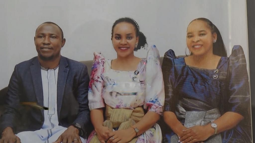Jovia Mutesi and her parents
