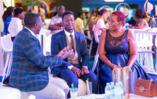 L-R: Brian Mulondo, the local content manager of MultiChoice Uganda, Jerry Sesanga the show director and Bina Baibe the host of the show, during the premiere of Mum Vs Wife.