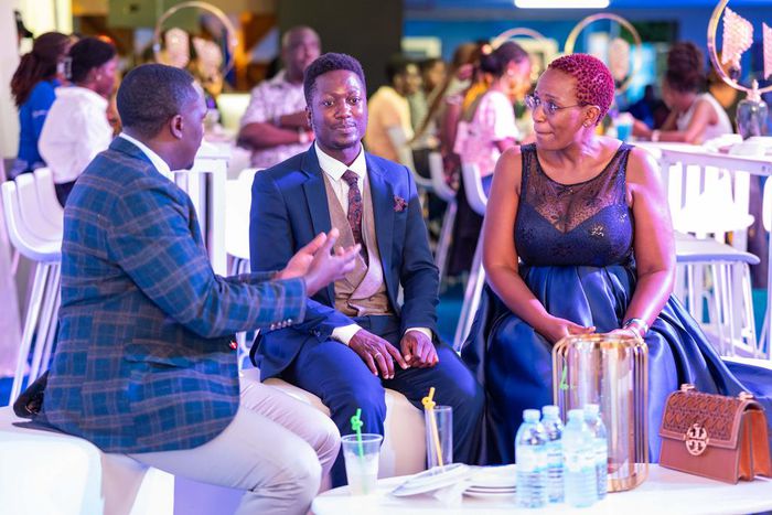 L-R: Brian Mulondo, the local content manager of MultiChoice Uganda, Jerry Sesanga the show director and Bina Baibe the host of the show, during the premiere of Mum Vs Wife.