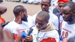 MP Muhammad Ssegirinya broke down in tears at Entebbe Airport while addressing press