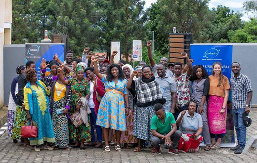 Patapia helps refugee women start and grow businesses powered by clean energy, such as snack kiosks and hair salons