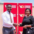 Next Media’s Chief Marketing Officer, Danze Edwin and Vision Group’s Head of Marketing and Communication, Lorraine Tukahirwa shake hands