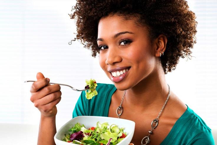 Woman eating vegetables(ebony)