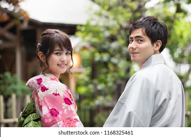 A japanese salary man hands over this salary to his wife [Shuttershock]