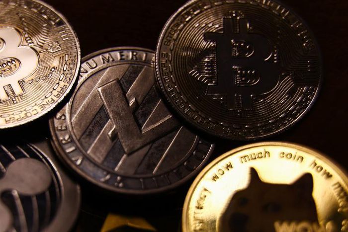 A representation of cryptocurrencies including bitcoin and dogecoin are seen in this illustration photo.Jakub Porzycki/NurPhoto via Getty Images