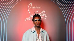 Joeboy attends Christian Louboutin Men Fall/Winter 2023 Collection in partnership with i-D on January 20, 2023 in Paris, France. (Photo by Victor Boyko/Getty Images for Christian Louboutin)