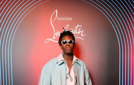 Joeboy attends Christian Louboutin Men Fall/Winter 2023 Collection in partnership with i-D on January 20, 2023 in Paris, France. (Photo by Victor Boyko/Getty Images for Christian Louboutin)