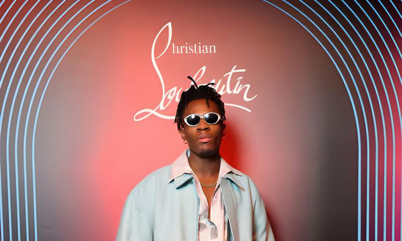 Joeboy attends Christian Louboutin Men Fall/Winter 2023 Collection in partnership with i-D on January 20, 2023 in Paris, France. (Photo by Victor Boyko/Getty Images for Christian Louboutin)