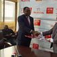 DTB CEO Varghese Thambi and Tetteh Ayitevie, the CEO of Prudential Uganda at the signing of the MoU