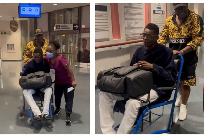 Singer Jose Chameleone being wheeled out of Hospital