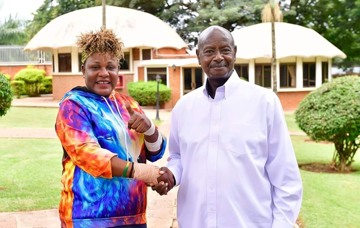 Full Figure with President Yoweri Museveni