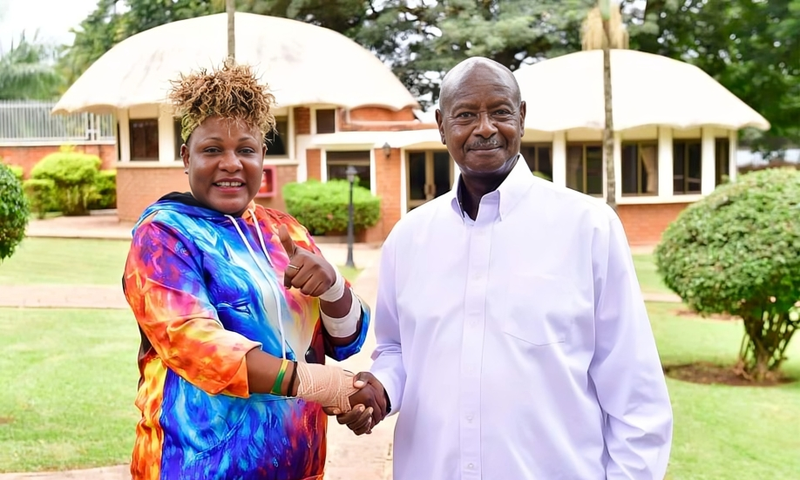 Full Figure with President Yoweri Museveni